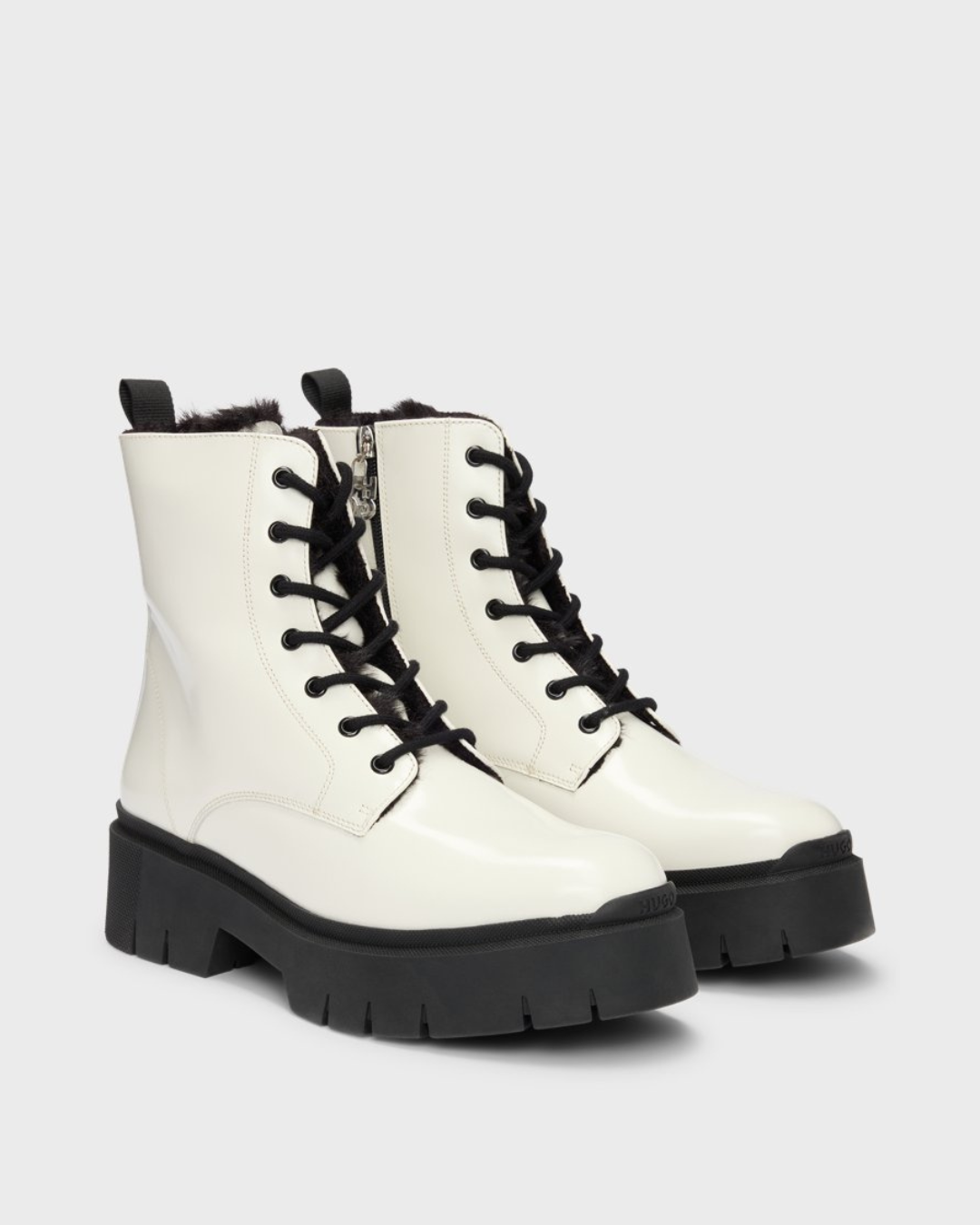 Faux leather ankle boots with logo zip (Hugo)